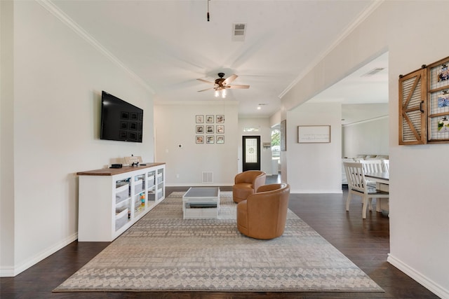 15393 Armstrong Rd, Terrell, TX 75160 - living room with crown molding, dark wood-style floors, a ceiling fan, and baseboards