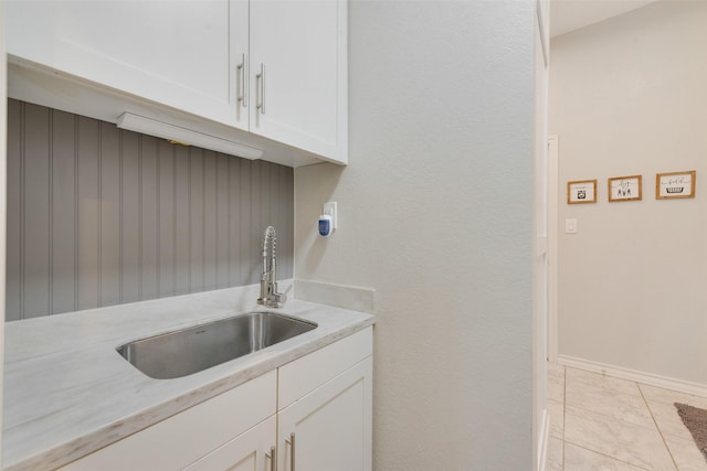 15393 Armstrong Rd, Terrell, TX 75160 - washroom with a sink and light tile patterned flooring