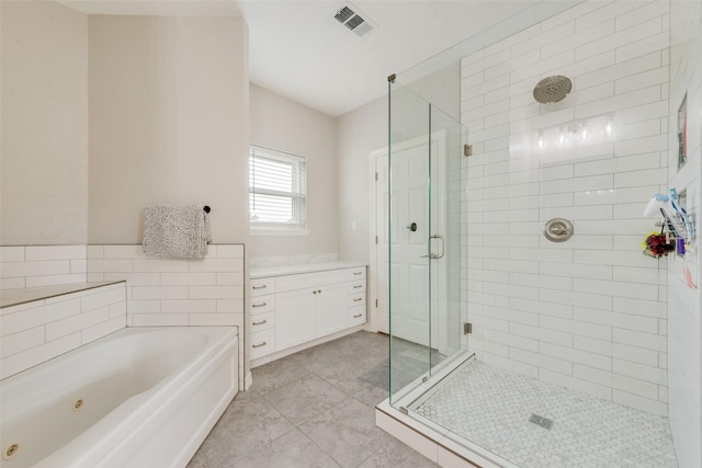 15393 Armstrong Rd, Terrell, TX 75160 - bathroom with a shower stall, a whirlpool tub, tile patterned flooring, and vanity