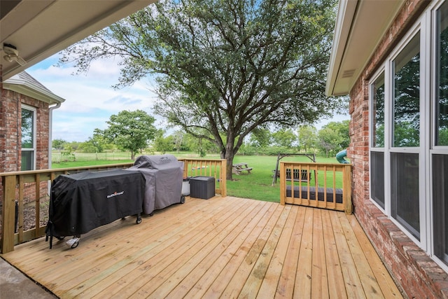 15393 Armstrong Rd, Terrell, TX 75160 - wooden terrace with a yard and grilling area
