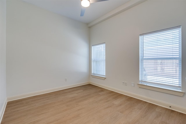 1811 S Ervay St, Dallas, TX 75215 - spare room featuring light wood-type flooring, ceiling fan, and baseboards