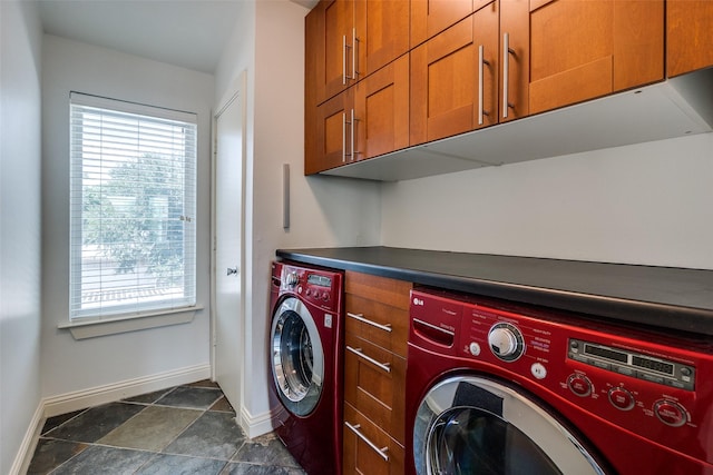 1811 S Ervay St, Dallas, TX 75215 - laundry area featuring washing machine and dryer, cabinet space, baseboards, and plenty of natural light