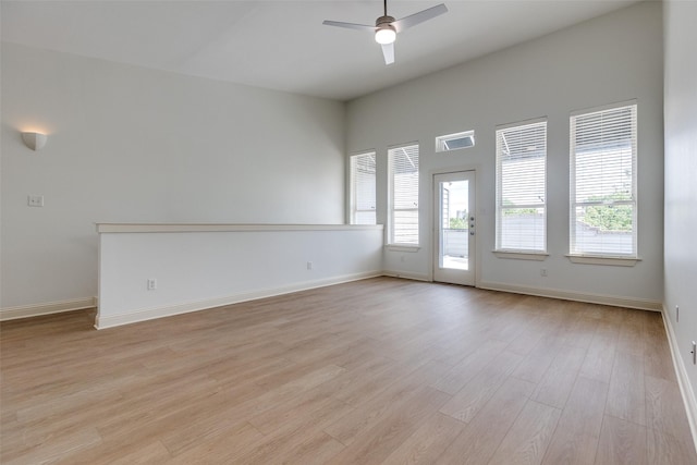 1811 S Ervay St, Dallas, TX 75215 - unfurnished room with ceiling fan, light wood-type flooring, and baseboards