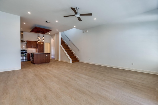 1811 S Ervay St, Dallas, TX 75215 - unfurnished living room featuring baseboards, light wood-type flooring, recessed lighting, and a ceiling fan