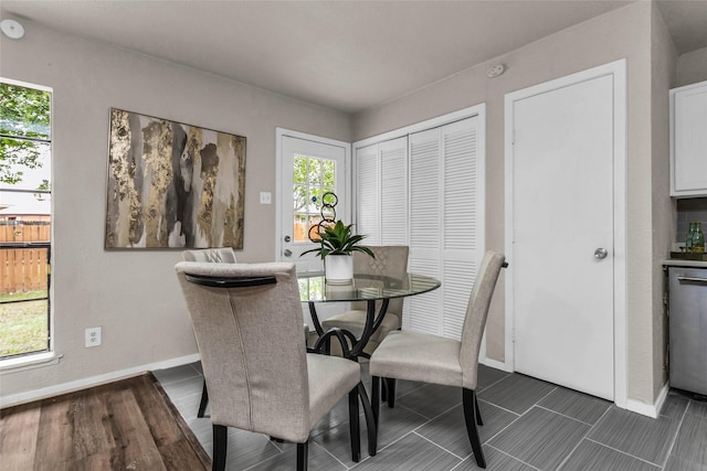 527 Cumberland Dr, Allen, TX 75002 - dining space featuring baseboards and dark wood finished floors