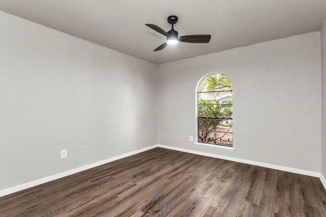 527 Cumberland Dr, Allen, TX 75002 - unfurnished room featuring dark wood-style flooring, baseboards, and ceiling fan