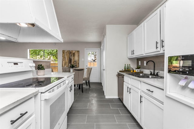 527 Cumberland Dr, Allen, TX 75002 - kitchen featuring white range with electric stovetop, a sink, stainless steel dishwasher, backsplash, and white cabinets
