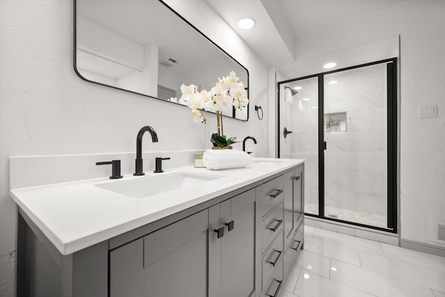 626 Pebblecreek Dr, Garland, TX 75040 - bathroom with double vanity, a stall shower, and recessed lighting