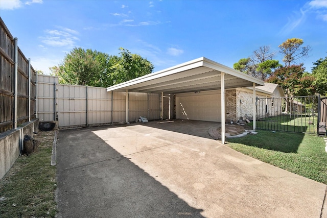 626 Pebblecreek Dr, Garland, TX 75040 - view of parking / parking lot with driveway and a carport