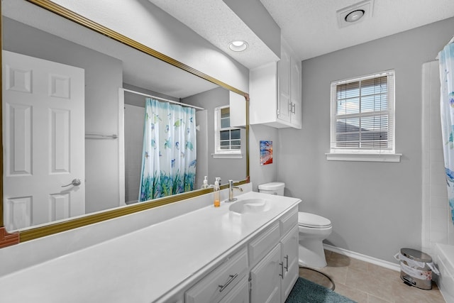 7413 Dana Ln, North Richland Hills, TX 76182 - full bath with toilet, vanity, baseboards, a shower with shower curtain, and tile patterned floors