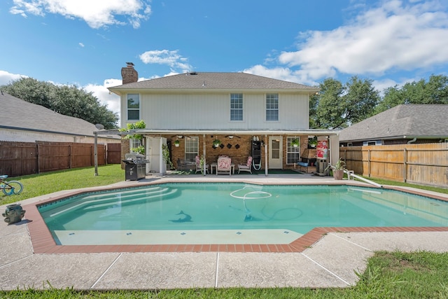 7413 Dana Ln, North Richland Hills, TX 76182 - view of pool with a patio and area for grilling