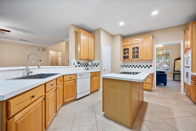 4207 Timber Trail Ct, Arlington, TX 76016 - kitchen featuring white appliances, a sink, tasteful backsplash, light countertops, and light tile patterned floors
