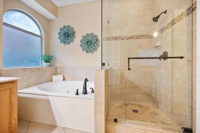 4207 Timber Trail Ct, Arlington, TX 76016 - full bathroom featuring a shower stall, a bath, vanity, and tile patterned floors