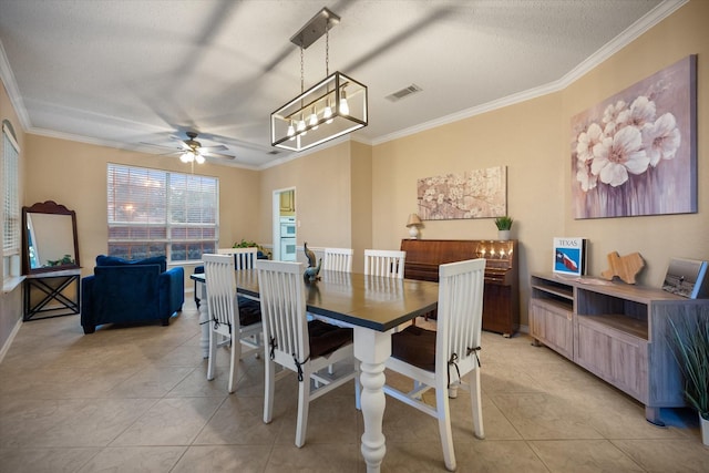 4207 Timber Trail Ct, Arlington, TX 76016 - dining space with ornamental molding, a ceiling fan, light tile patterned floors, and a textured ceiling