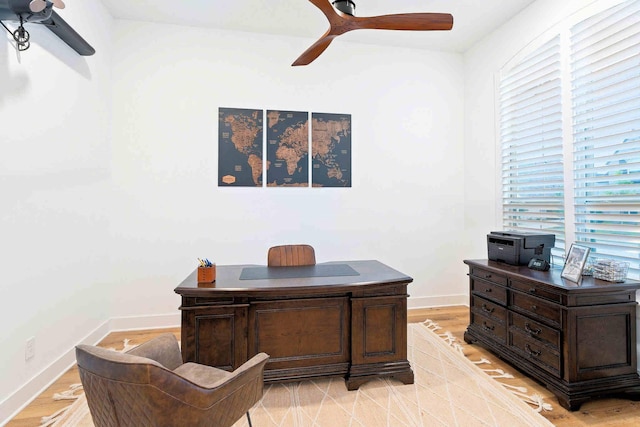 4124 Sandbrock Pkwy, Aubrey, TX 76227 - office area featuring healthy amount of natural light, ceiling fan, light wood-style floors, and baseboards