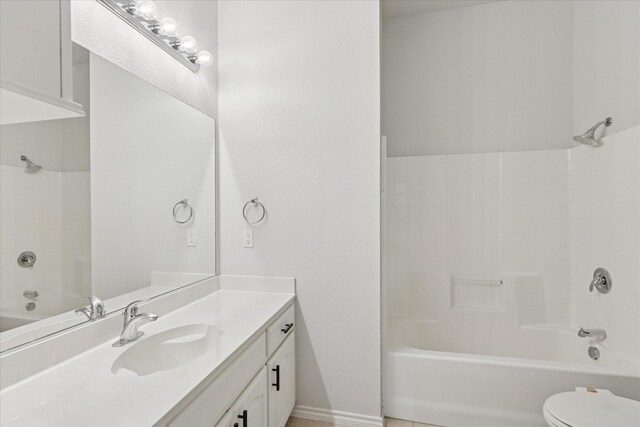 10237 Red Bluff Ln, Fort Worth, TX 76177 - bathroom featuring vanity, toilet, and  shower combination