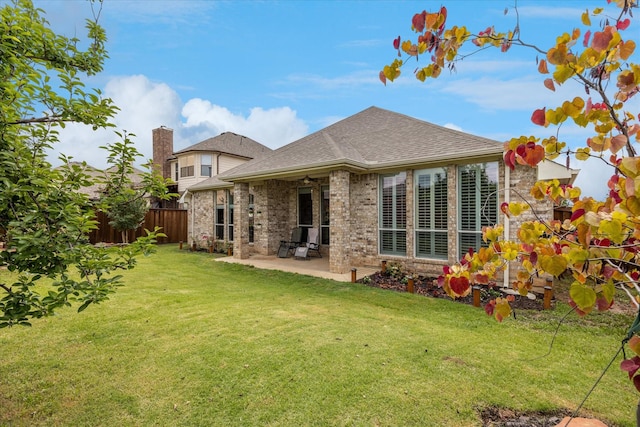 10237 Red Bluff Ln, Fort Worth, TX 76177 - back of house with a patio, brick siding, a chimney, ceiling fan, and a shingled roof