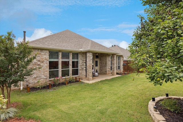 10237 Red Bluff Ln, Fort Worth, TX 76177 - back of property with a patio area, a shingled roof, and brick siding