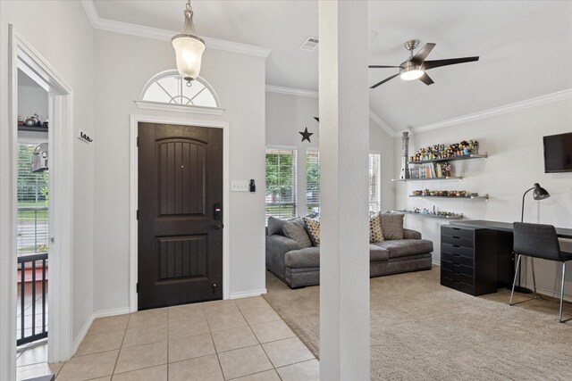 10237 Red Bluff Ln, Fort Worth, TX 76177 - foyer featuring ornamental molding, ceiling fan, light carpet, lofted ceiling, and baseboards
