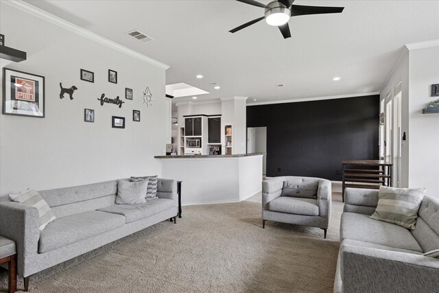 10237 Red Bluff Ln, Fort Worth, TX 76177 - carpeted living room with ornamental molding, ceiling fan, and recessed lighting