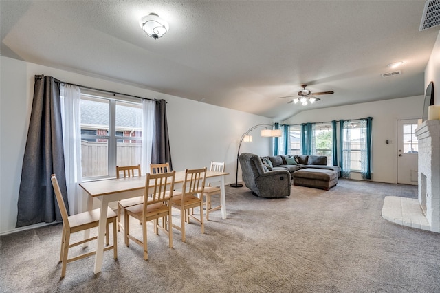 4178 Parterre Dr, Frisco, TX 75033 - dining space featuring carpet flooring, a ceiling fan, lofted ceiling, and a textured ceiling