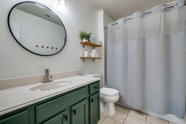 4178 Parterre Dr, Frisco, TX 75033 - full bath with vanity, toilet, tile patterned floors, a textured ceiling, and shower / tub combo with curtain