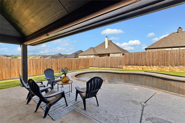 2512 Bunker Hill Dr, Burleson, TX 76028 - fenced backyard with a patio