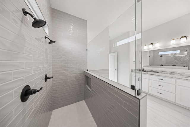 7009 Ranch View Pl, Springtown, TX 76082 - bathroom featuring a tile shower and double vanity