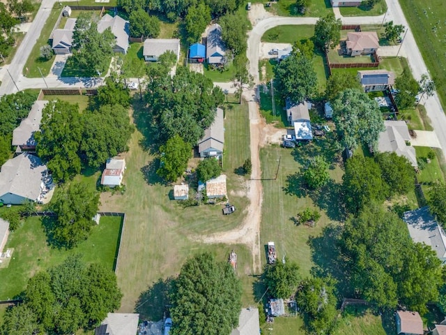219 E Evans St, Pilot Point, TX 76258 - aerial overview of property's location featuring nearby suburban area