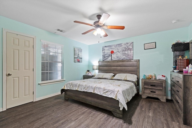 427 Paddy St, Mesquite, TX 75149 - bedroom with wood finished floors, baseboards, and a ceiling fan