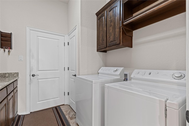 136 Spring Meadow Dr, Springtown, TX 76082 - laundry room featuring cabinet space and separate washer and dryer