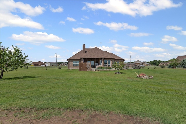 136 Spring Meadow Dr, Springtown, TX 76082 - back of house featuring a chimney and brick siding