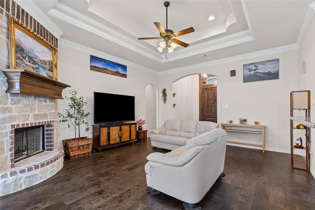 136 Spring Meadow Dr, Springtown, TX 76082 - living area with a raised ceiling, arched walkways, hardwood / wood-style flooring, ceiling fan, and ornamental molding