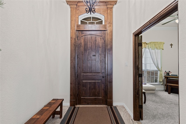 136 Spring Meadow Dr, Springtown, TX 76082 - foyer with carpet, baseboards, and ornamental molding