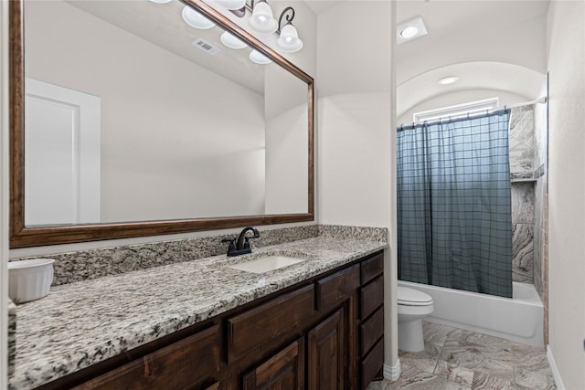 136 Spring Meadow Dr, Springtown, TX 76082 - bathroom featuring toilet, vanity, marble finish floors, and shower / tub combination