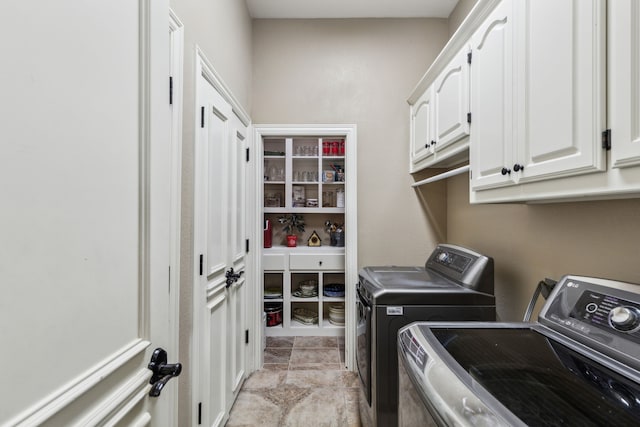 5005 Summerbrook Dr, Colleyville, TX 76034 - washroom featuring washing machine and dryer and cabinet space