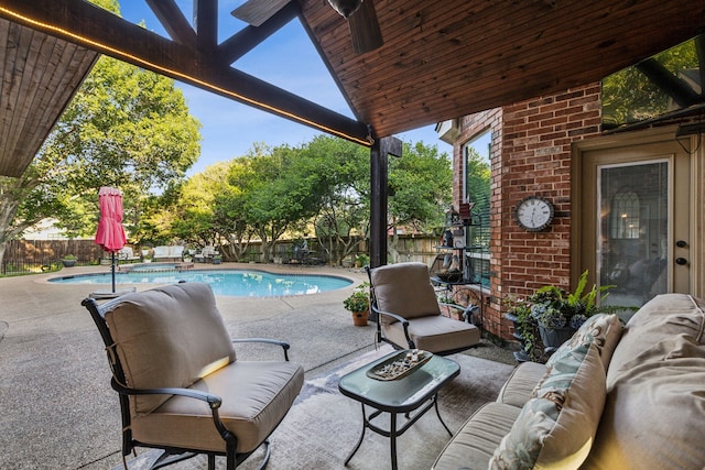 5005 Summerbrook Dr, Colleyville, TX 76034 - fenced backyard with an outdoor hangout area, a patio area, and a pool with connected hot tub