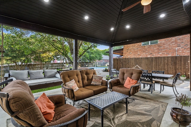 5005 Summerbrook Dr, Colleyville, TX 76034 - fenced backyard featuring an outdoor hangout area, outdoor dining space, a patio area, and a ceiling fan