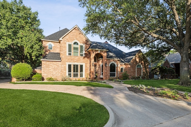 5005 Summerbrook Dr, Colleyville, TX 76034 - traditional-style house with brick siding and a shingled roof