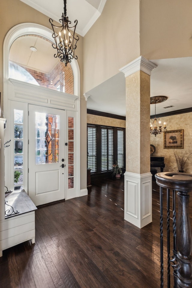 5005 Summerbrook Dr, Colleyville, TX 76034 - entrance foyer featuring a chandelier, wood finished floors, a towering ceiling, decorative columns, and crown molding