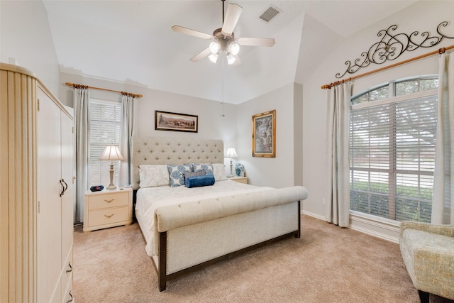 6702 Amesbury Ln, Rowlett, TX 75089 - bedroom with vaulted ceiling, light carpet, multiple windows, ceiling fan, and baseboards