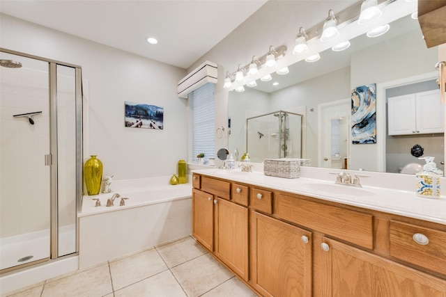 6702 Amesbury Ln, Rowlett, TX 75089 - full bath with a stall shower, a garden tub, double vanity, and tile patterned floors