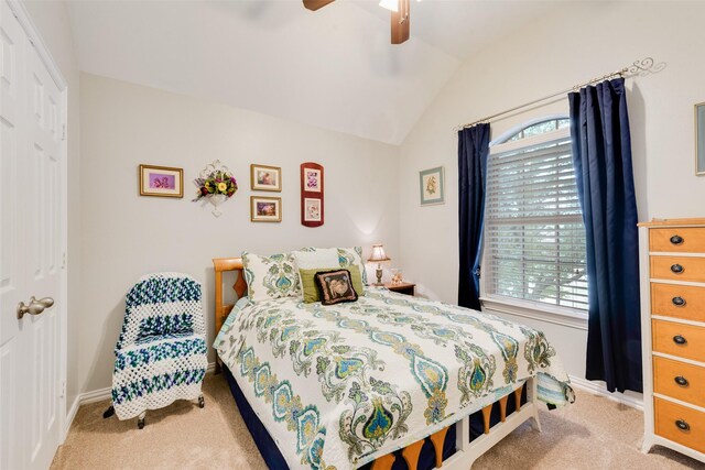 6702 Amesbury Ln, Rowlett, TX 75089 - carpeted bedroom with vaulted ceiling, baseboards, ceiling fan, and a closet