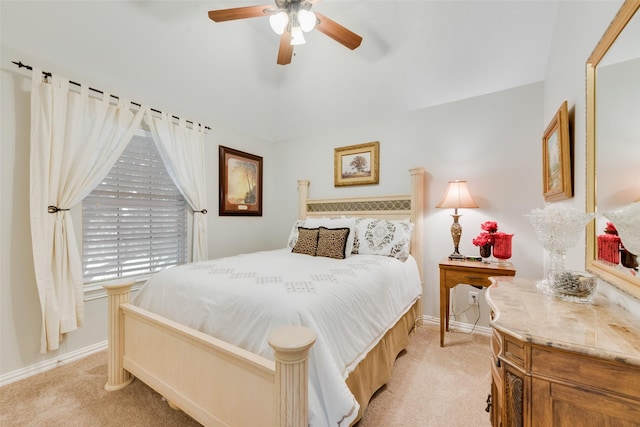 6702 Amesbury Ln, Rowlett, TX 75089 - bedroom with light carpet, baseboards, and ceiling fan