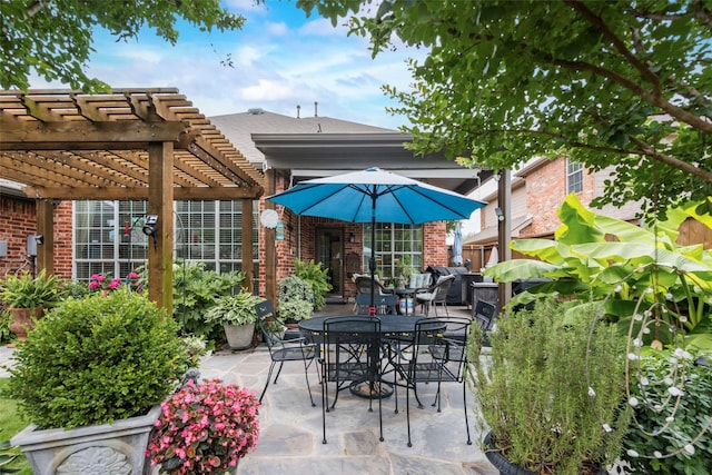 6702 Amesbury Ln, Rowlett, TX 75089 - view of patio with a pergola and outdoor dining area