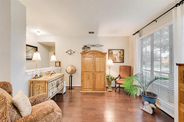 6702 Amesbury Ln, Rowlett, TX 75089 - sitting room with dark wood-type flooring and baseboards