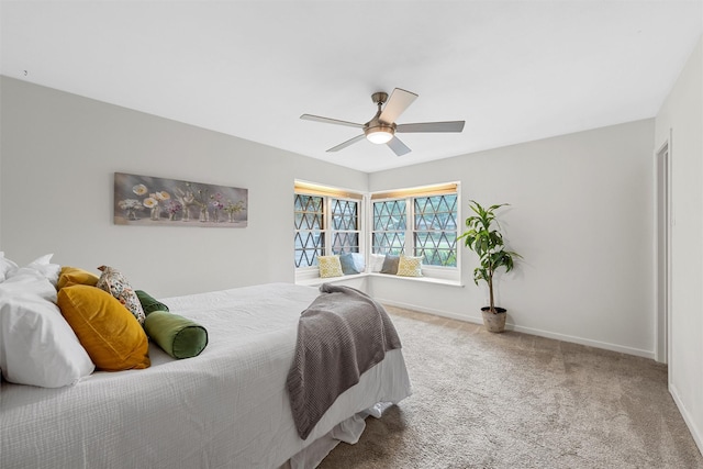 2607 Glendale Dr, Waco, TX 76710 - bedroom with carpet flooring, baseboards, and ceiling fan
