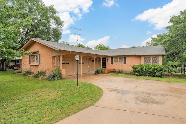 2607 Glendale Dr, Waco, TX 76710 - ranch-style house featuring brick siding, a garage, a front yard, and concrete driveway