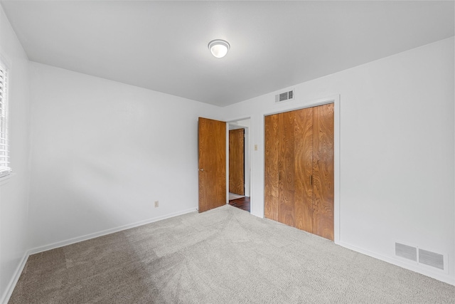2607 Glendale Dr, Waco, TX 76710 - unfurnished bedroom with carpet, baseboards, and a closet