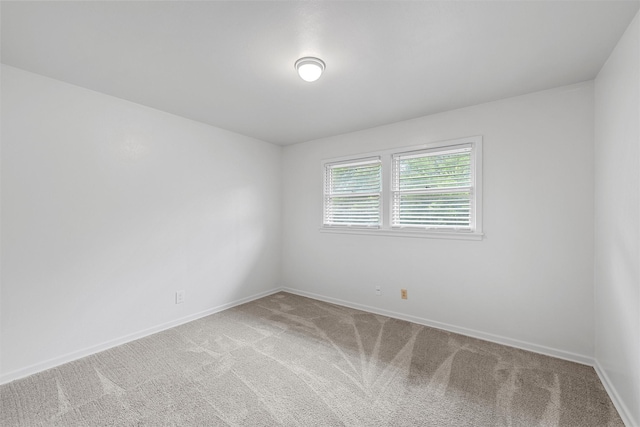 2607 Glendale Dr, Waco, TX 76710 - empty room featuring light colored carpet and baseboards